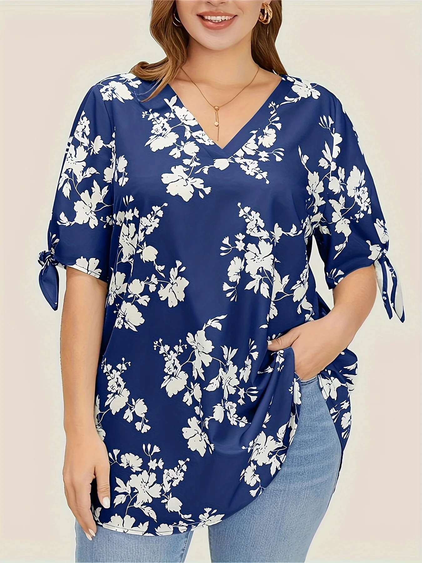 Plus size spring and summer light printed knotted V-neck shirt women's style loose version type office elegant temperament wear