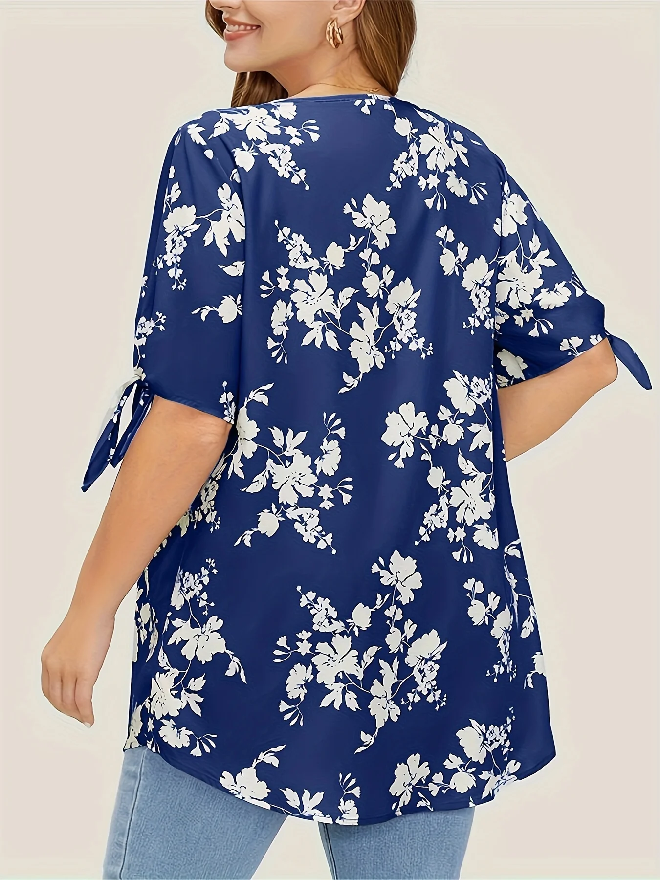 Plus size spring and summer light printed knotted V-neck shirt women's style loose version type office elegant temperament wear